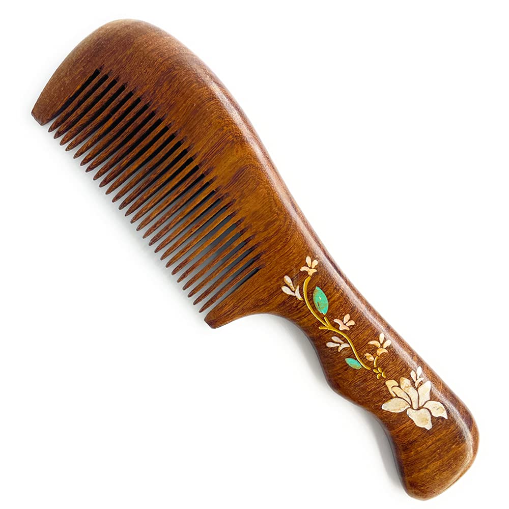 Hand holding a comb, combing a small section of hair straight out from the head